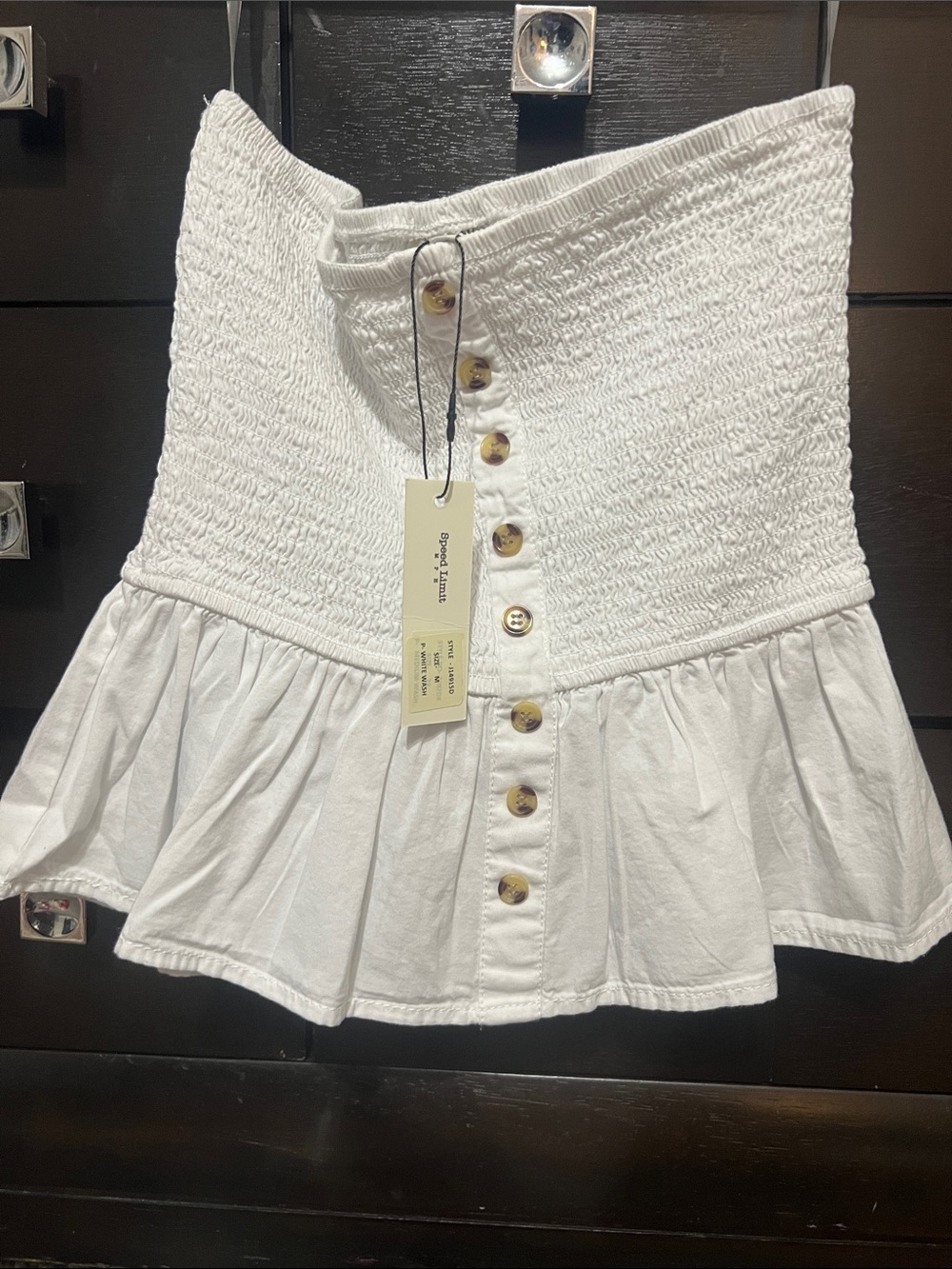 White smocked strapless top